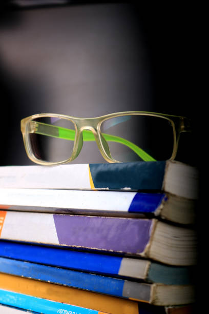 istock glasses and books 1176690369