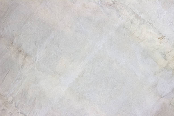 istock Gray concreted wall for interiors or outdoor exposed surface polished concrete. Cement have sand and stone of tone vintage, natural patterns old antique, design floor texture background. 1176691121