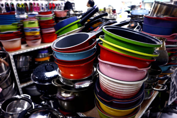istock Assorted colorful ceramic and steel cooking pans 1176694396