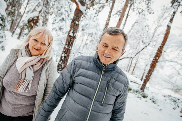 istock Mature Couple in Winter Park 1176694457