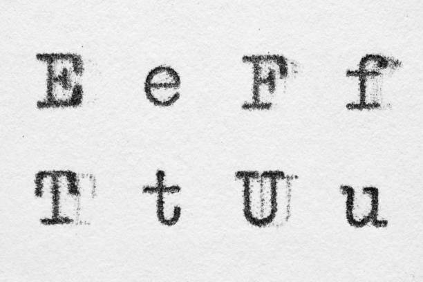 istock Real typewriter font alphabet with letters E, F, T, U 1176694752