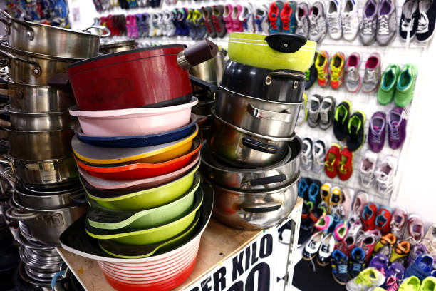 istock Assorted colorful ceramic and steel cooking pans 1176694753