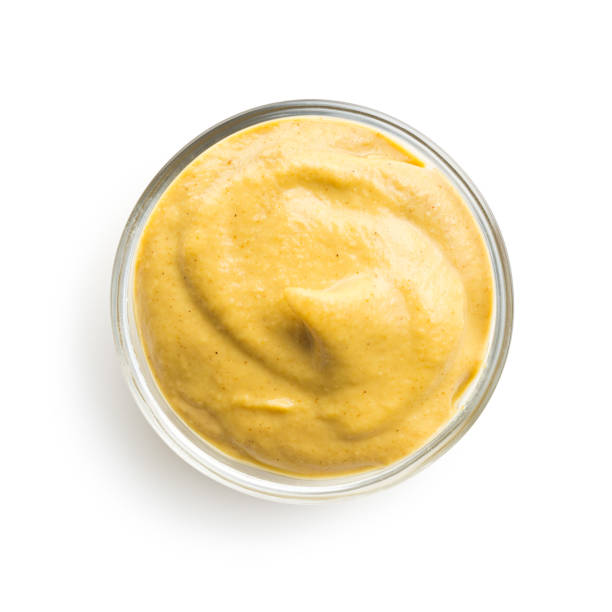 moutarde jaune dans le bol - mustard bowl isolated condiment photos et images de collection