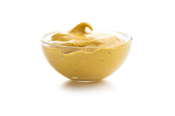 istock Yellow mustard in bowl 1176696425
