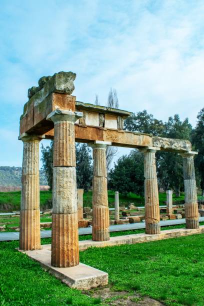 istock Columns of a ruined Greek temple.Nice blue sky at the background. 1176697921