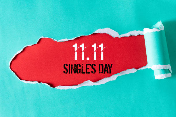 online shopping of china, 11.11 single's day sale concept. top view of green pastel torn paper and the text 11.11 single's day sale on a red background. - xi imagens e fotografias de stock