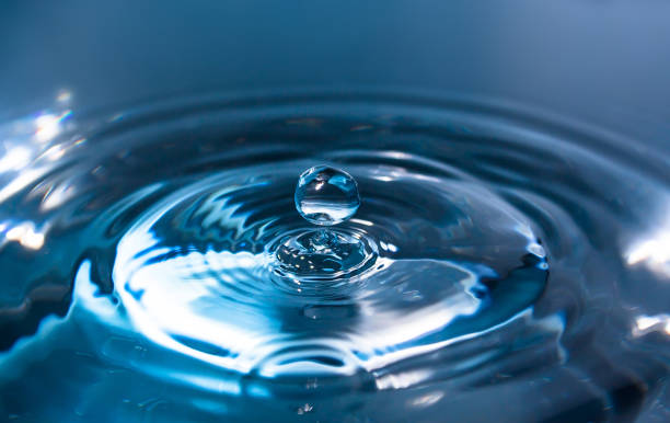istock Water splash or drop. Water splash close-up. Blue water drop. Falling water 1176699849