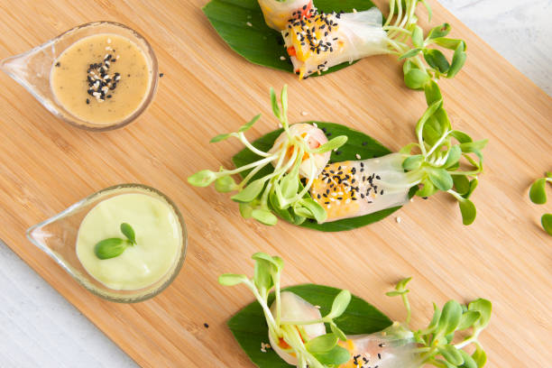 istock Rice paper salad rolls with carrot,sunflower sprout, corn and crab stick 1176703117