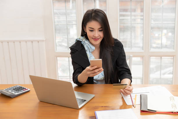istock Freelancer business woman working with computer laptop in cafe. 1176707383