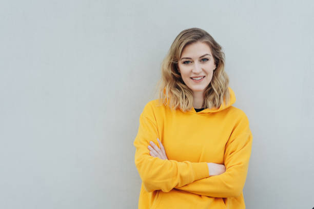 istock Relaxed happy young woman smiling at the camera 1176711034