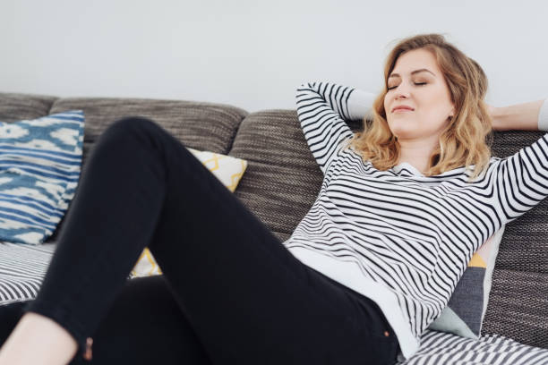 istock Young woman taking a moment to relax 1176711077