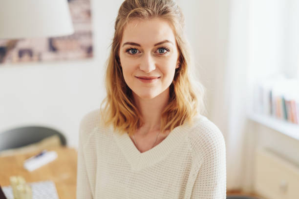 istock Pretty young blond woman with a friendly smile 1176711216