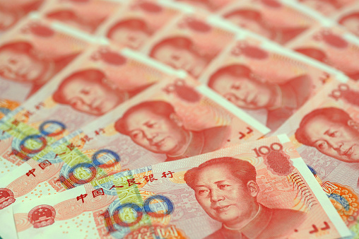 Lot's of 100 Chinese Yuan notes filled the entire frame of the picture