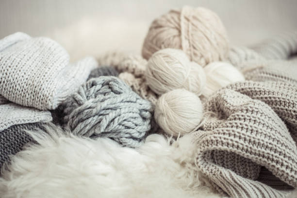 istock cozy background Wallpaper with the yarn for knitting. 1176712817