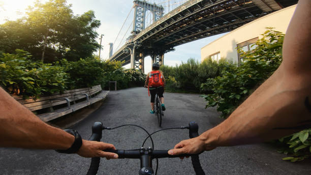 Bicycle POV: ride by the Brooklyn Bridge, NY city