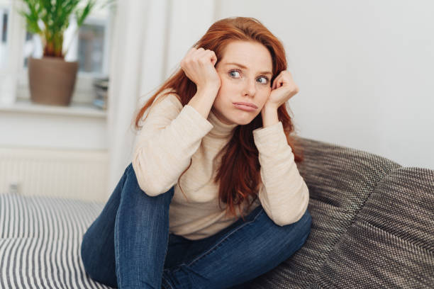 istock Glum young woman pouting her lips 1176713731