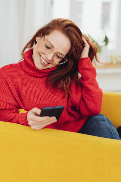 istock Happy young woman relaxing with her mobile 1176713814