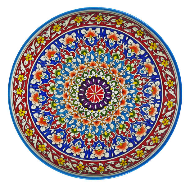 istock Oriental colorful patterns on a wooden plate. 1176714929