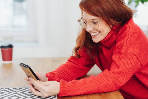 istock Young redhead woman with a happy grin 1176715702