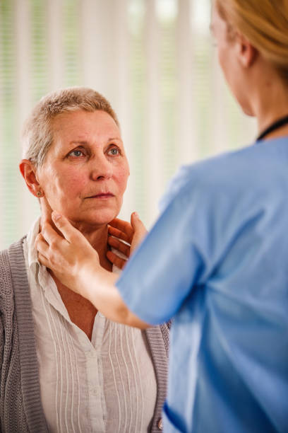 istock Senior woman getting her glands examined 1176718283
