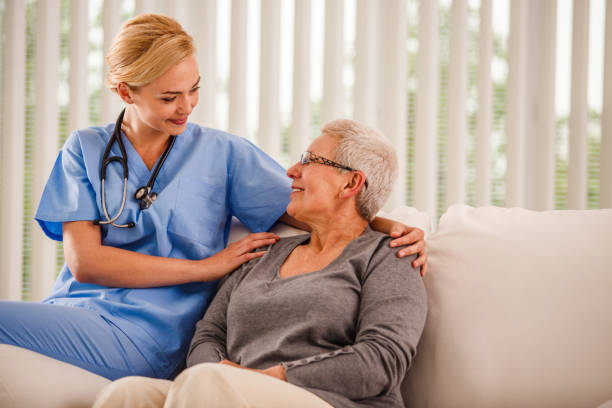 istock Patient talking to a smiling nurse 1176718348