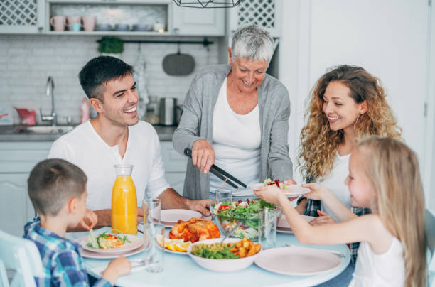 istock Multi-generation family having lunch at home. 1176720825