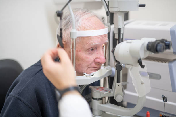 istock Elderly man with retinal thrombosis visited by the ophthalmologist 1176721169