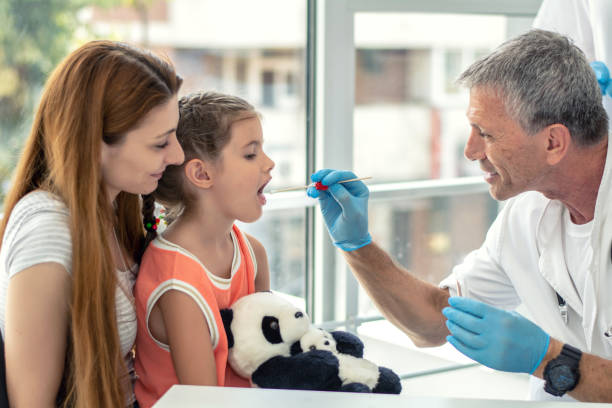 doctor testing biological specimen - coccus stock-fotos und bilder