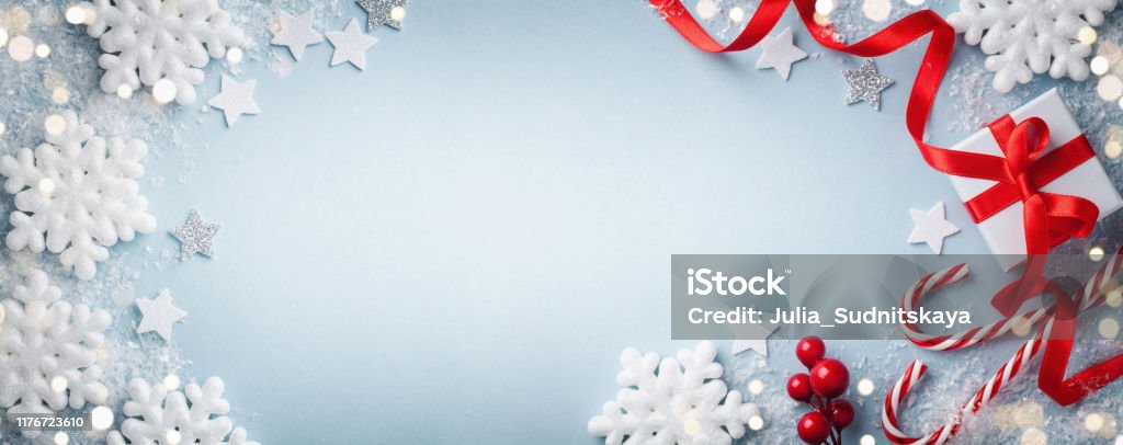 Christmas Blue Background Gift Or Present Box White Snowflakes And Holiday  Decoration Top View Happy New Year Card Banner Format Stock Photo -  Download Image Now - iStock