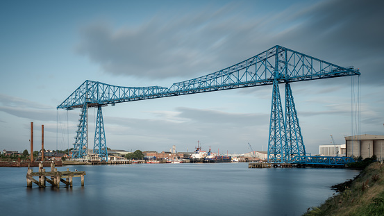 Middlesbrough Transporter Bridge at sunrise. The Bridge carries people and cars over the River Tees in a suspended gondola