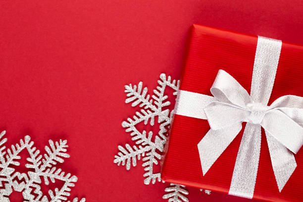 istock Christmas, holiday present box on red background. 1176725506