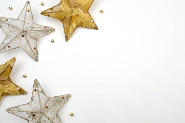 istock Creative Christmas layout. Decorative stars on white background whit copy space. 1176725764