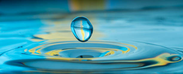 istock water drop falling and impacting a body of water 1176734563