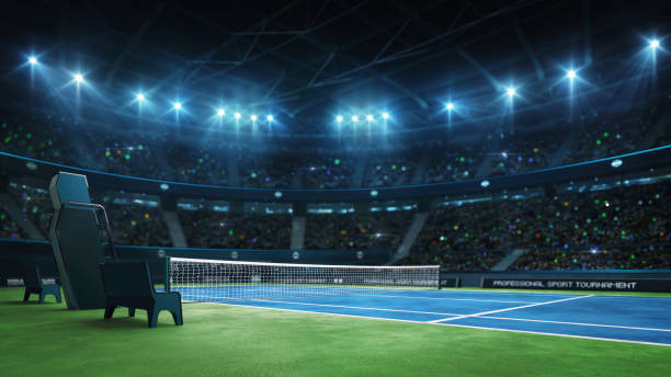 pista de tenis azul y arena cubierta iluminada con ventiladores, vista de esquina de la cancha - tennis court tennis net indoors fotografías e imágenes de stock