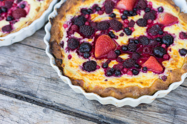 istock strawberry, mulberry and red raspberryt cake or pie 1176736538