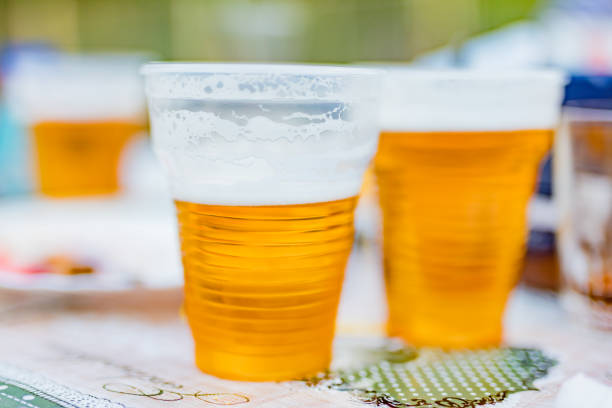 istock Beer glasses on a picnic table in the backyard. 1176739693
