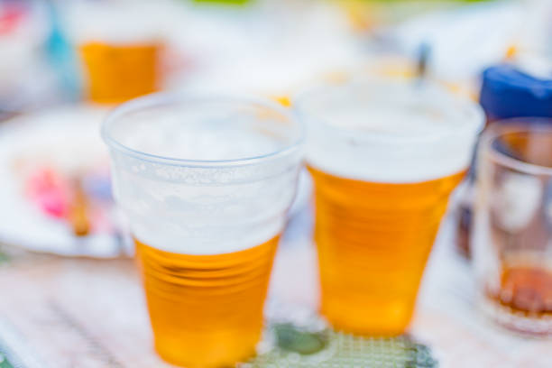istock Beer glasses on a picnic table in the backyard. 1176739712