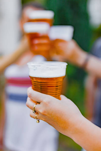 istock Friends enjoying drinking beer in the backyard. 1176740632