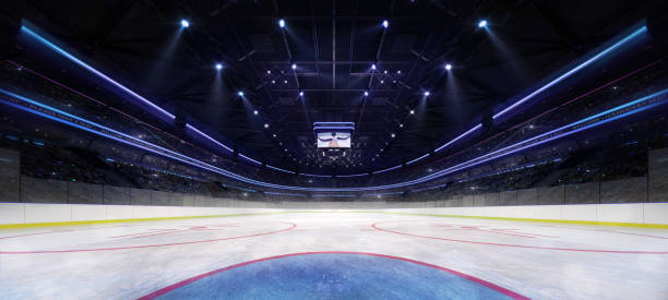 vista del portero interior del estadio de hockey sobre hielo iluminado por focos - hockey rink fotografías e imágenes de stock