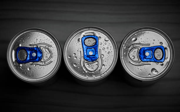 istock Three cans of energy drink covered with waterdrops 1176742669