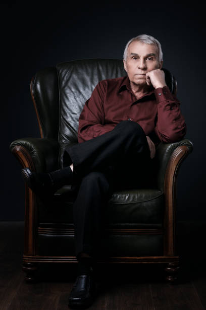 istock Senior man in armchair 1176742985