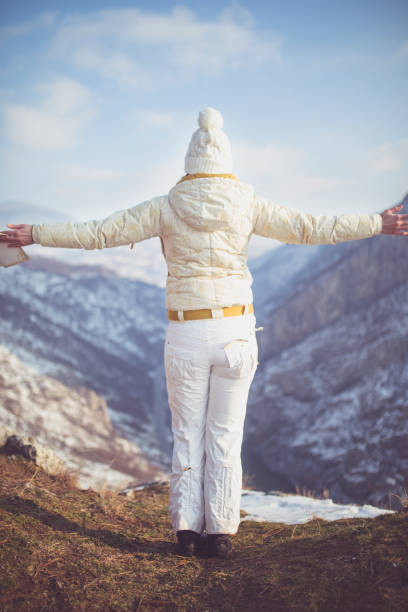 istock Woman hiker reading map in mountains on hiking trip. 1176743001