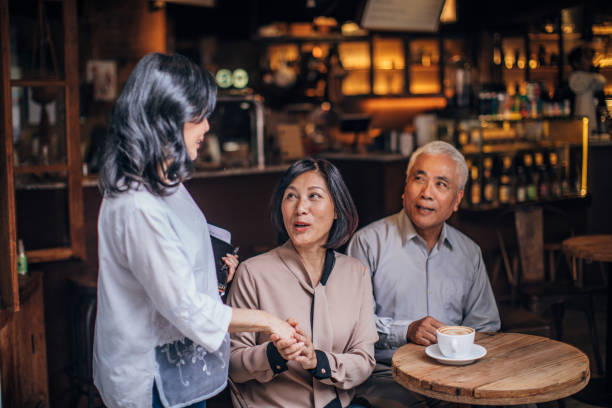 istock Three senior friends on coffee break in cafe 1176746397
