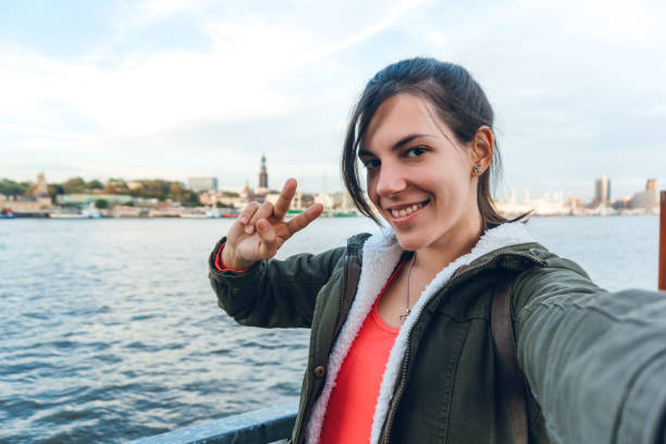 istock Tourist making selfies / vlogging in Hafen City 1176747918