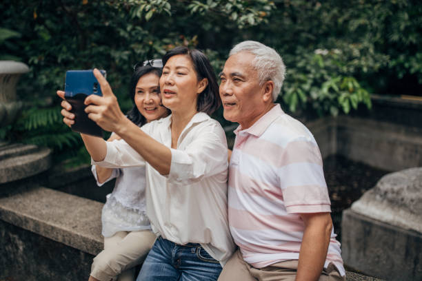 istock Senior friends taking a selfie together 1176749227