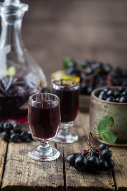 istock homemade chokeberry wine or liqueur 1176749894