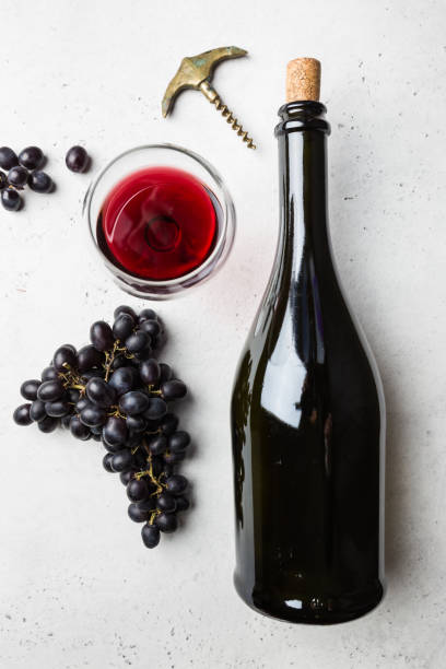 istock Red wine and ripe grapes 1176749981