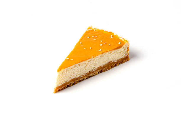 istock Piece of caramel cheesecake isolated on white background 1176753328