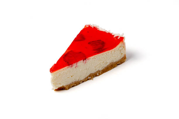 istock Piece of strawberry cheesecake isolated on white background 1176753350