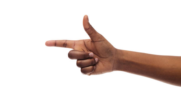 istock Black woman's hand pointing aside with index finger, closeup 1176756386